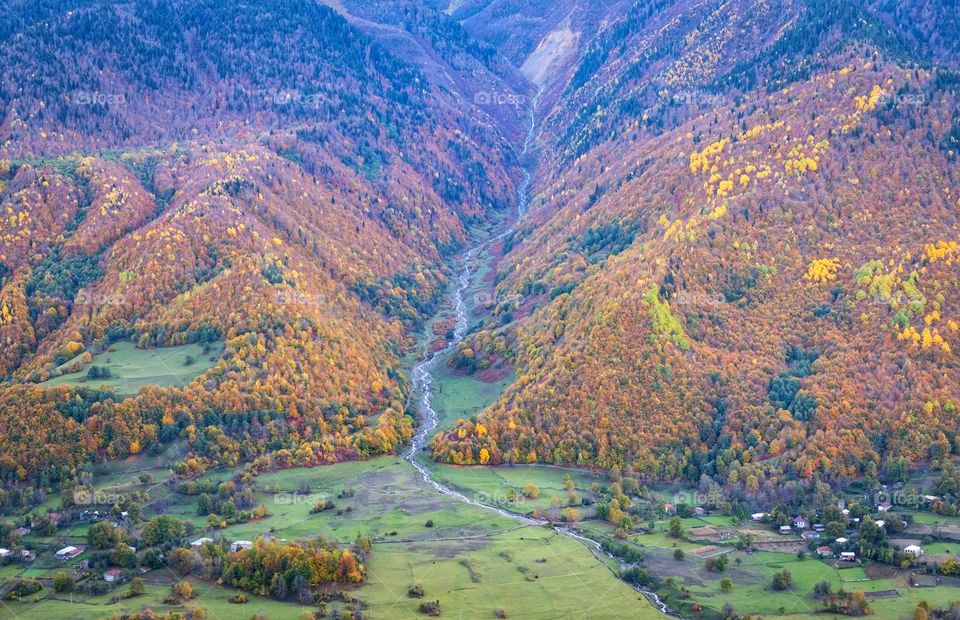 Colorful autumn scene of mountain scape along the way in Georgia 