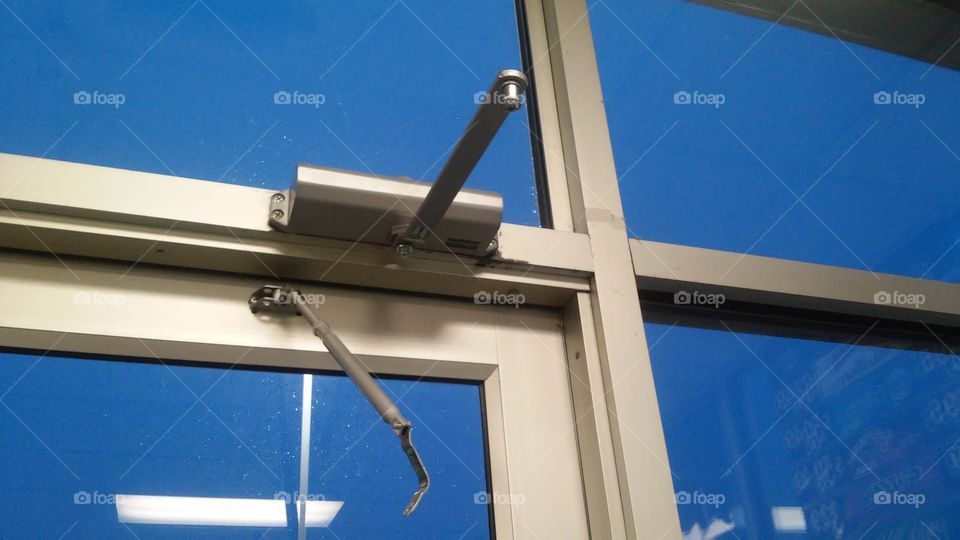 This is what happens when you have a snow storm with strong winds and it blows the door open at your work. Breaks the hinge.