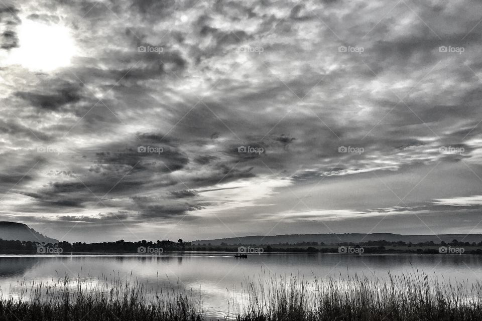 Scottish loch. Loch Leven in Kinross. A moody dreamy shot over the water with dramatic hills in the background.