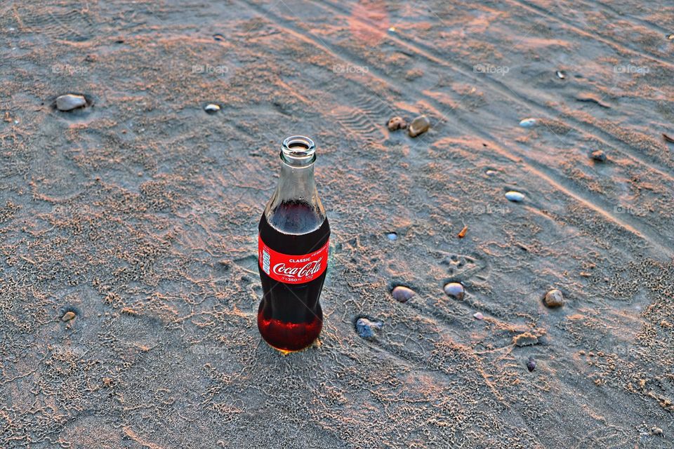 Enjoy your Coca Cola.