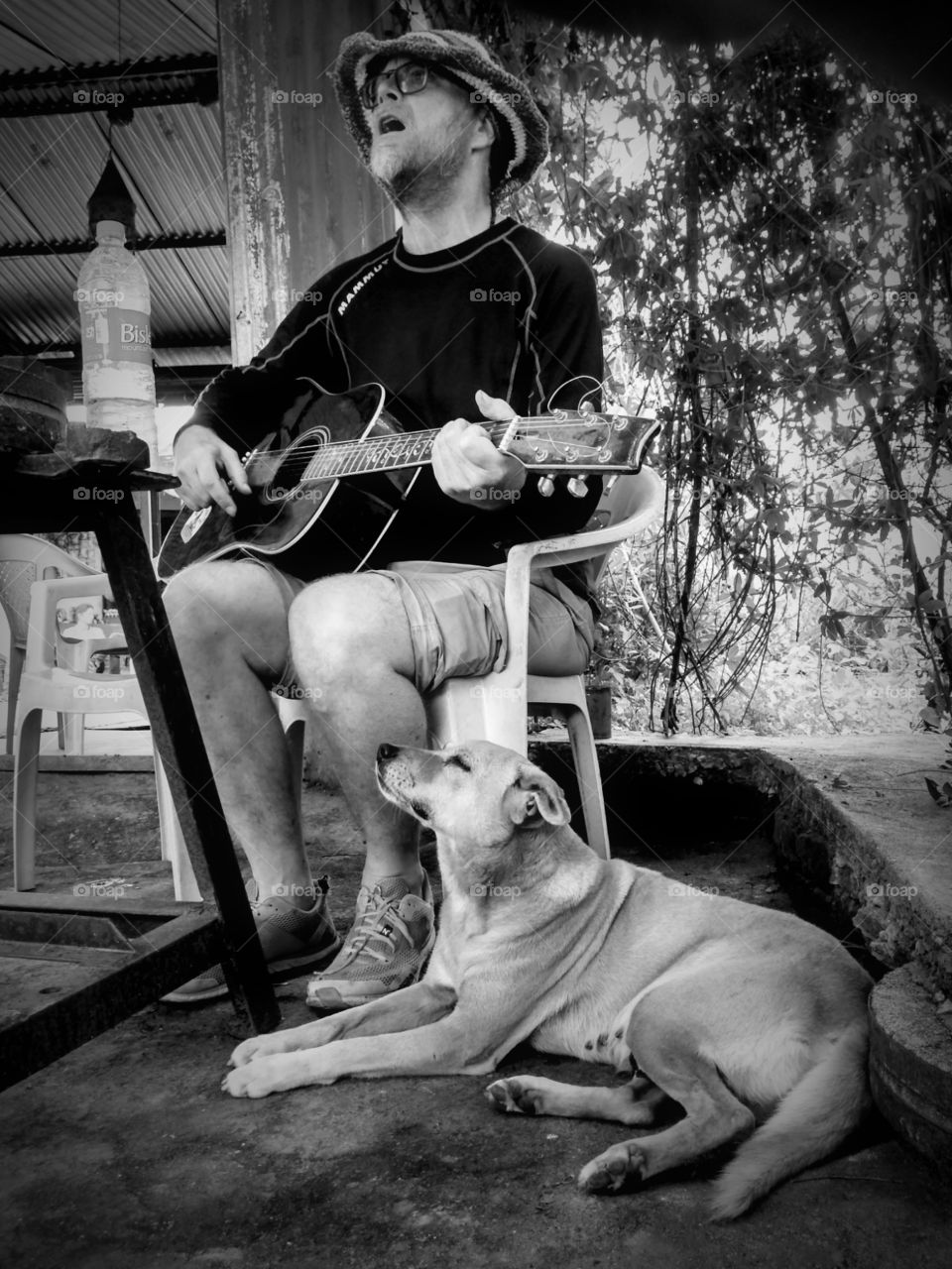 Man, Dog and music ceremony.