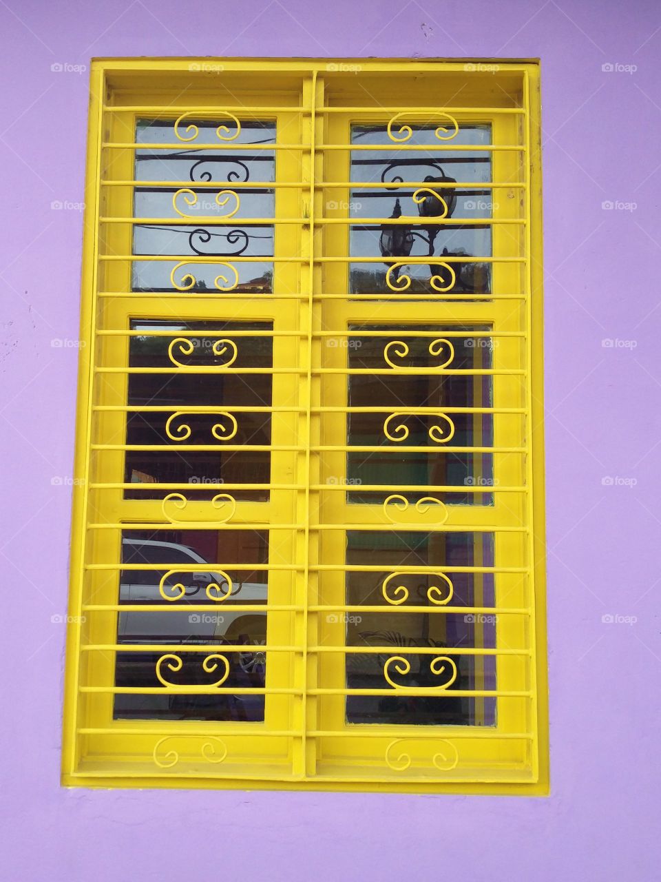 purple wall yellow window