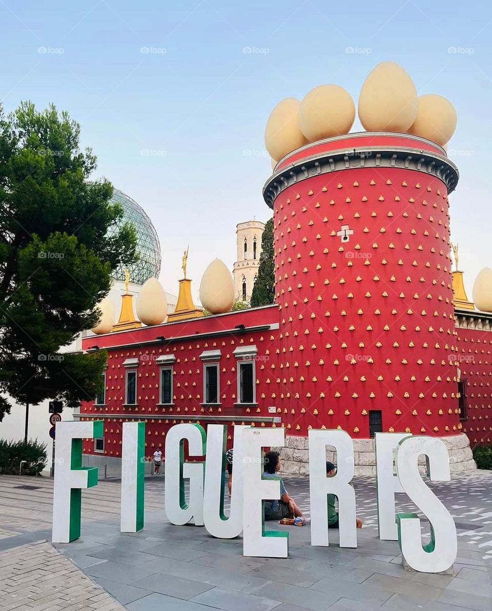 View on the red exterior facade of Dali's Theatre-Museum in Figueras