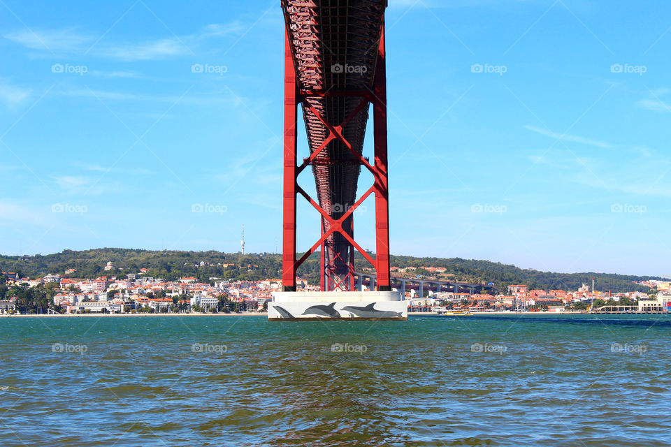Underneath 25 de Abril Bridge