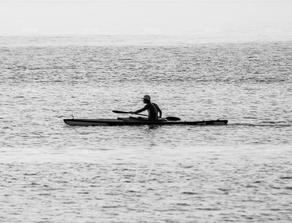Black and White People Sports  in action. Kayaking at the Long Chao Kok Coast..
