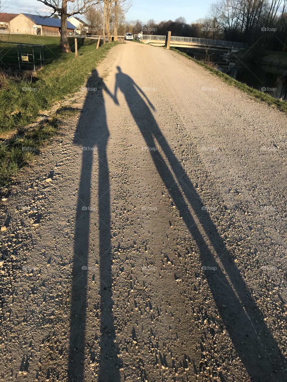 Couple’s shadow with holding hands…