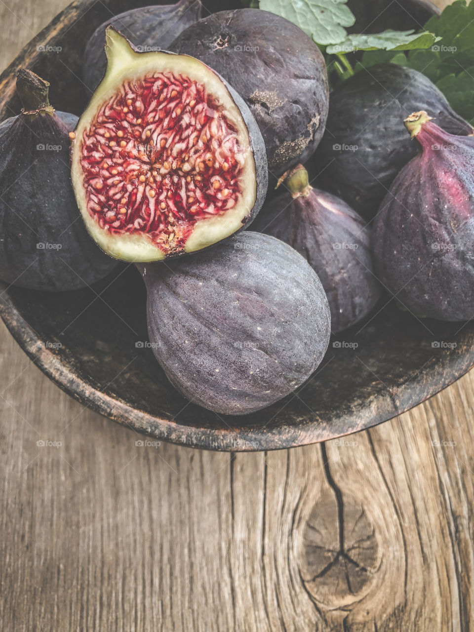Fresh figs in Vintage Wooden background