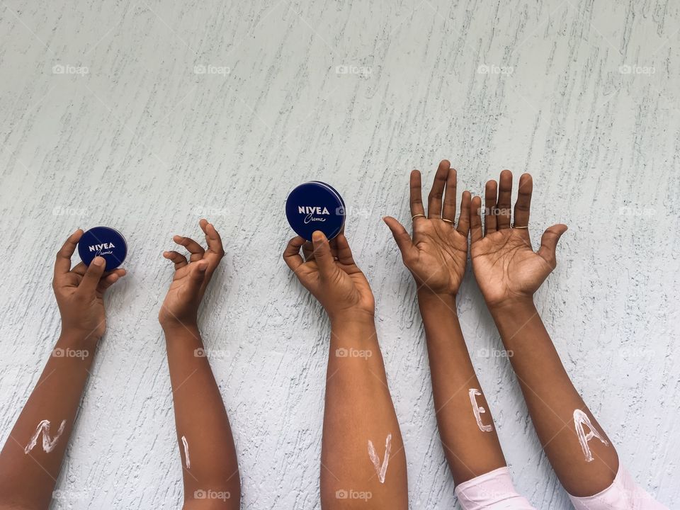 Hands with Nivea creme