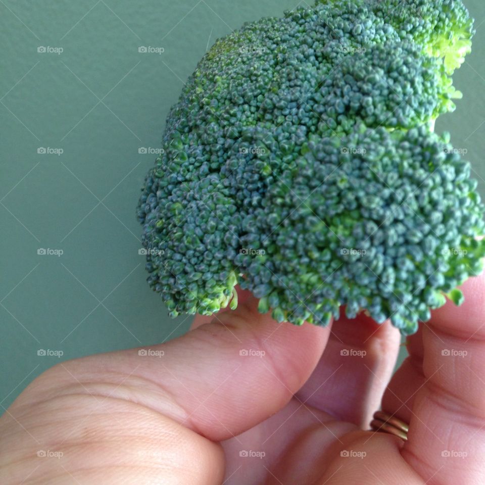 Holding broccoli 