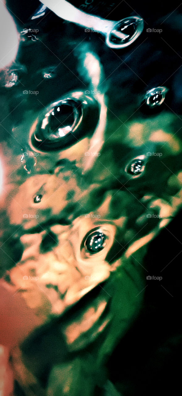 Closeup photo of clear floating water bubbles.