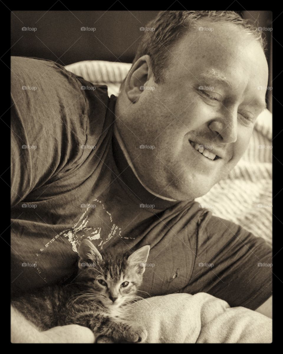 Man with a Small Kitten