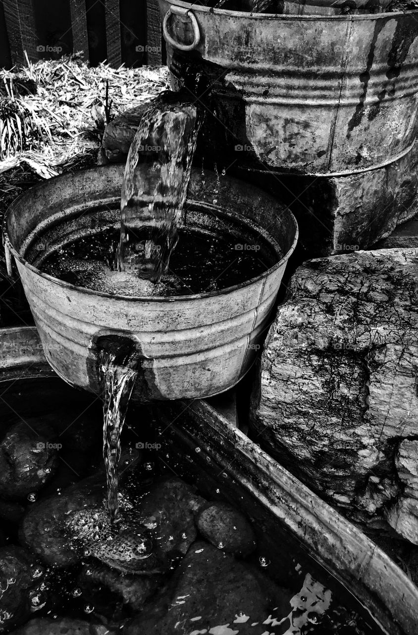 Fountain made out of old metal buckets—taken in New Era, Michigan 