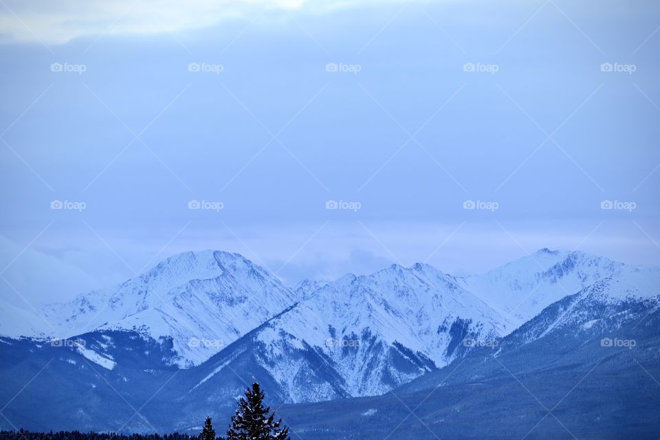 Nestled in the snow covered mountains.
