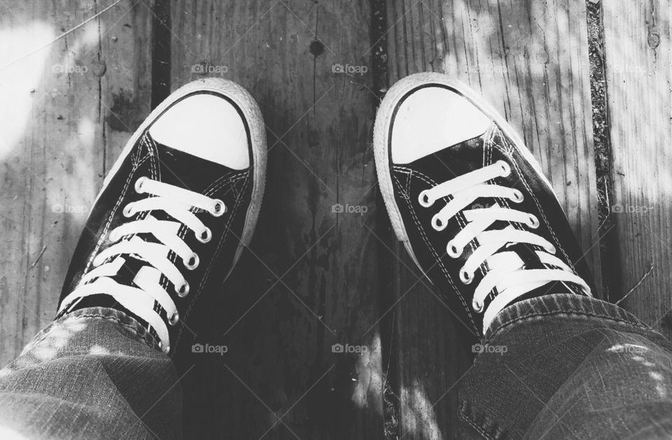 Picture of classic Converse sneakers in black and white.