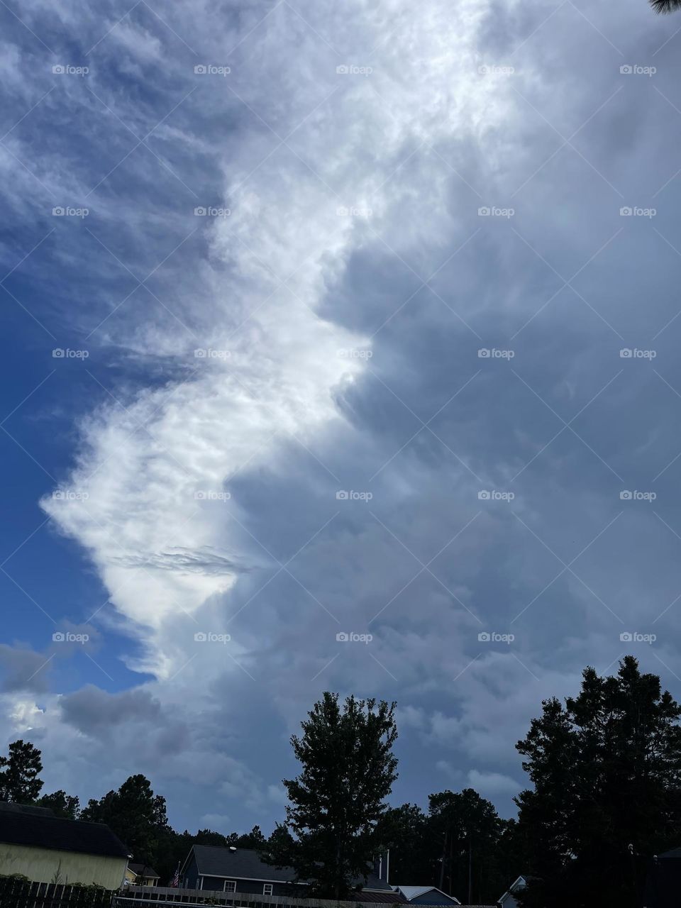 Awesome beautiful storm clouds rolling overhead on a very hot summer day July 2022. 