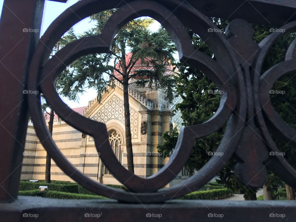 Church view through design fence 