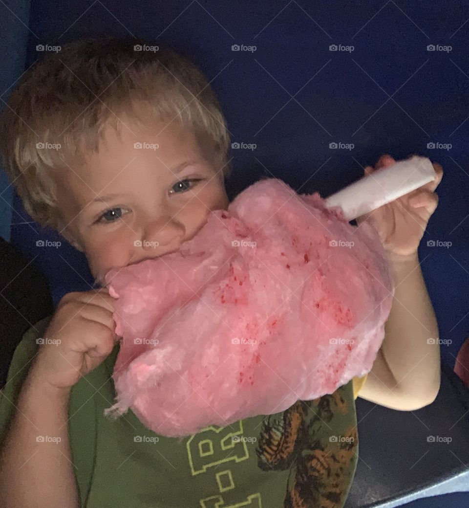 Eating cotton candy at the circus 