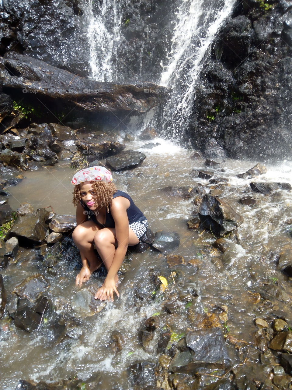 This photo was taken in a waterfall located  deep forest of mount Kenya.