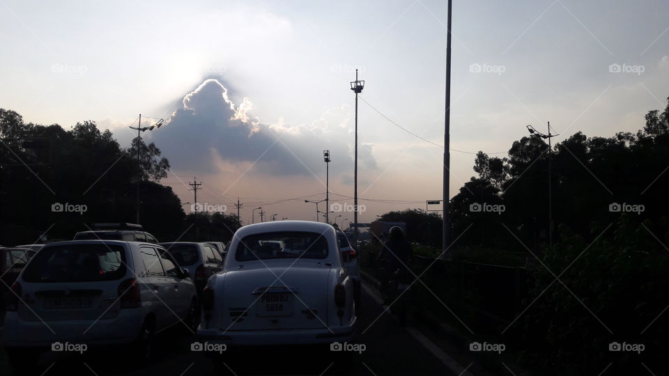 Ordinary days made extraordinary, by the play between sun and clouds.