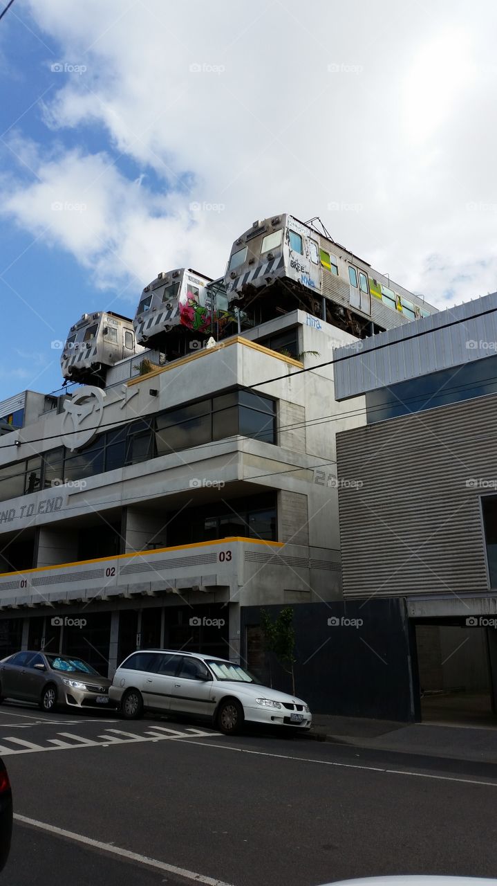 Tram restaurant on rooftop of buildings Melbourne.