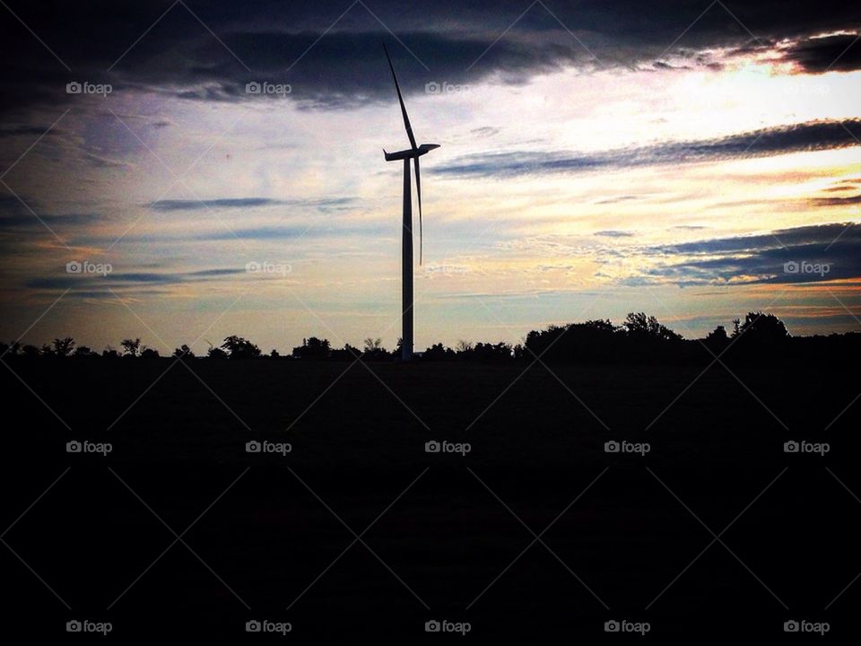 Untitled . An early morning photo of a wind turbine on Wolfe Island
