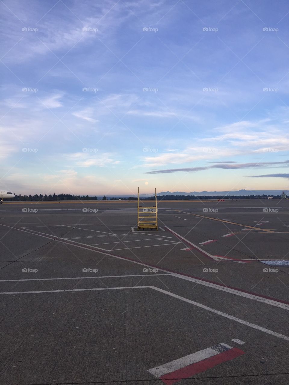 walking on the tarmac from the crew room on my early morning flight somewhere in the pacific northwest, stairway to the moon