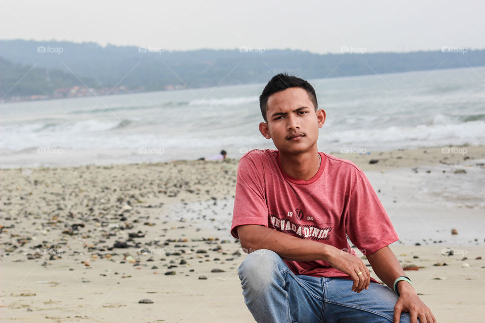 Young boy holiday on The kalianda Beach