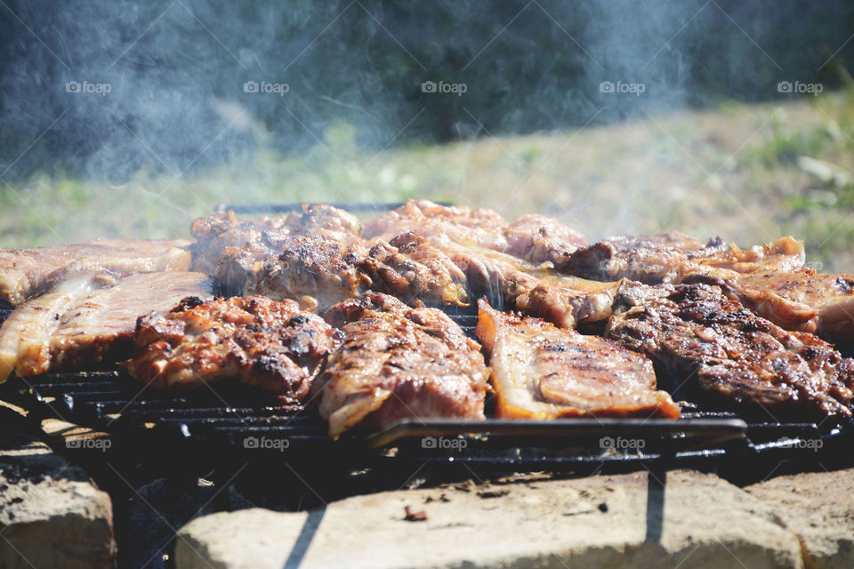 BBQ time!. Meat grilled on barbeque in outdoors