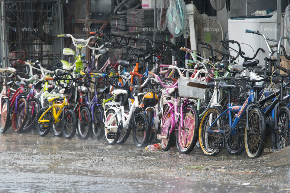 Group of objects bicycle behind rain