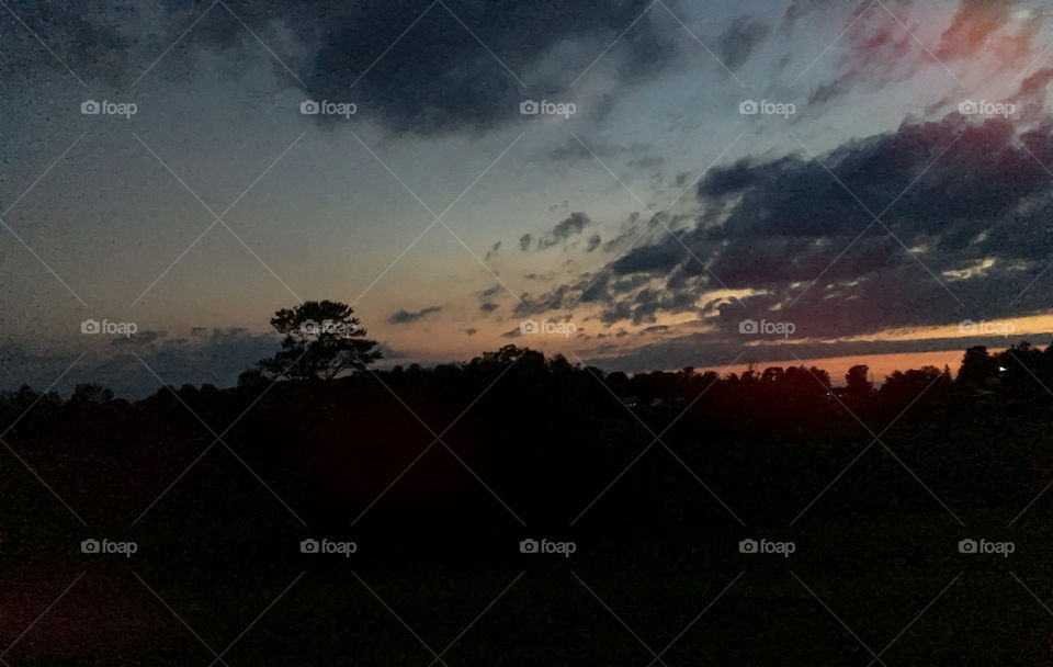 Sunset over the trees...the end of a summer day in the rural mountains of Vermont. 