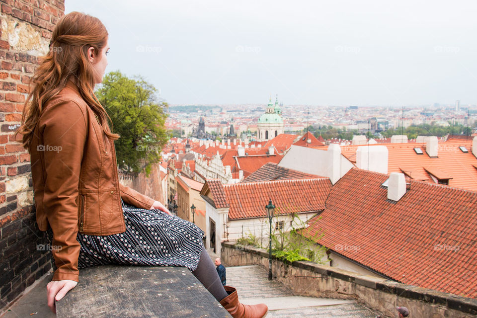 Woman looking at city