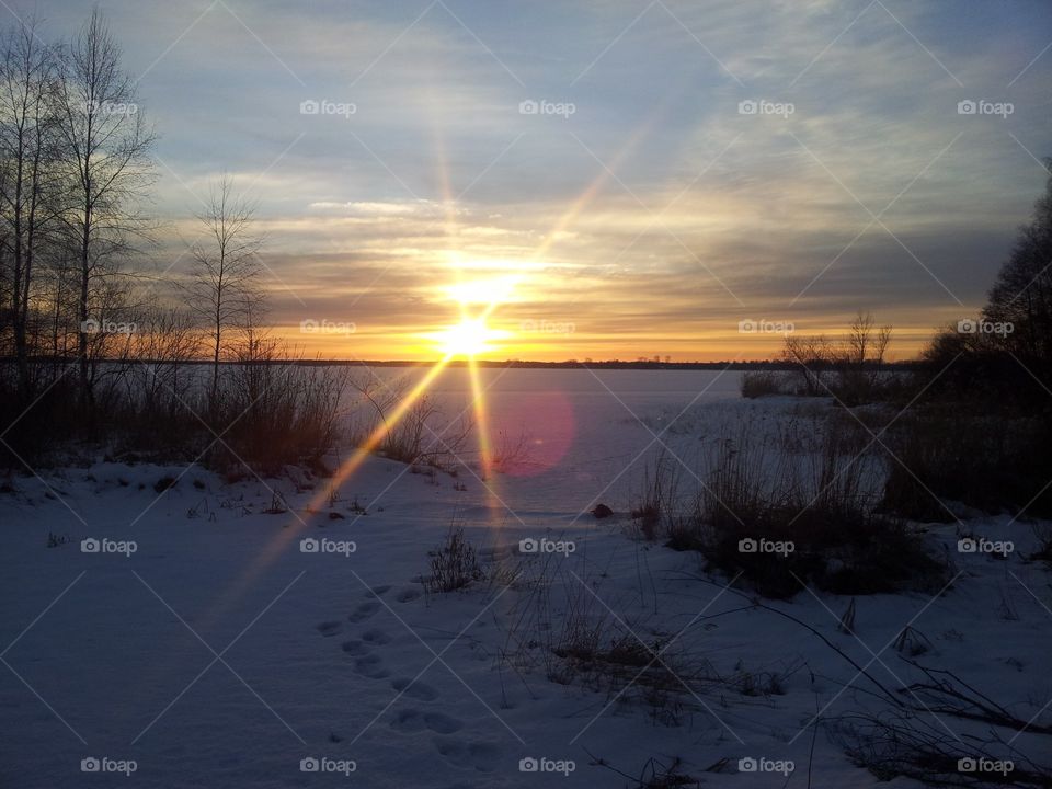 grayness of the day and dim the sun