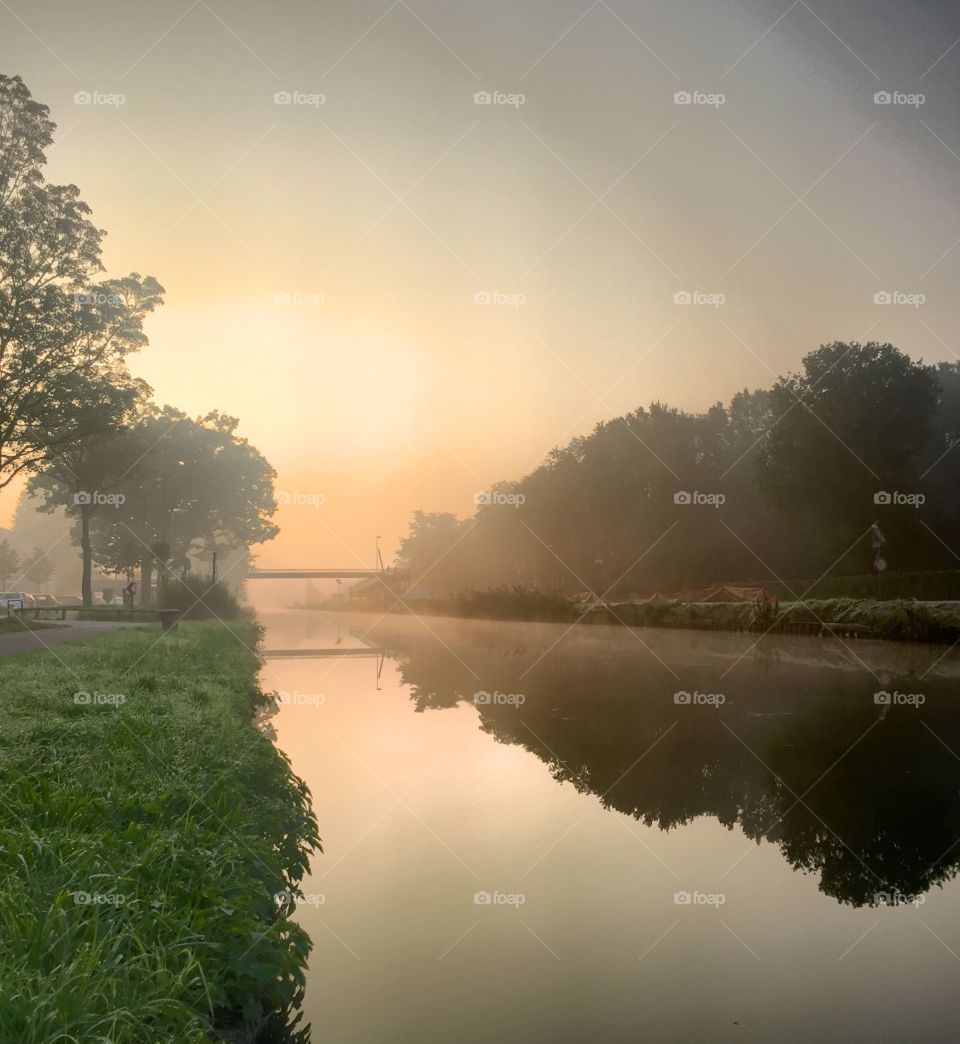 Golden mist over The water