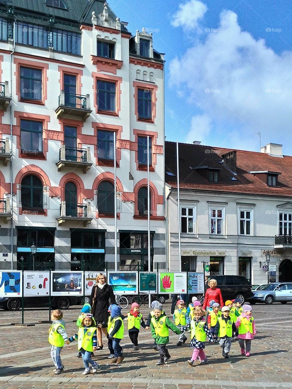 Children walking on a sunny day at Krakow Poland