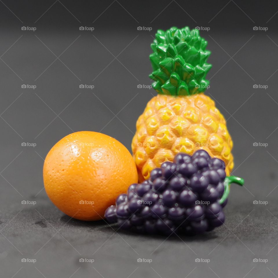 A small collection of kids play food that is eerily realistic 