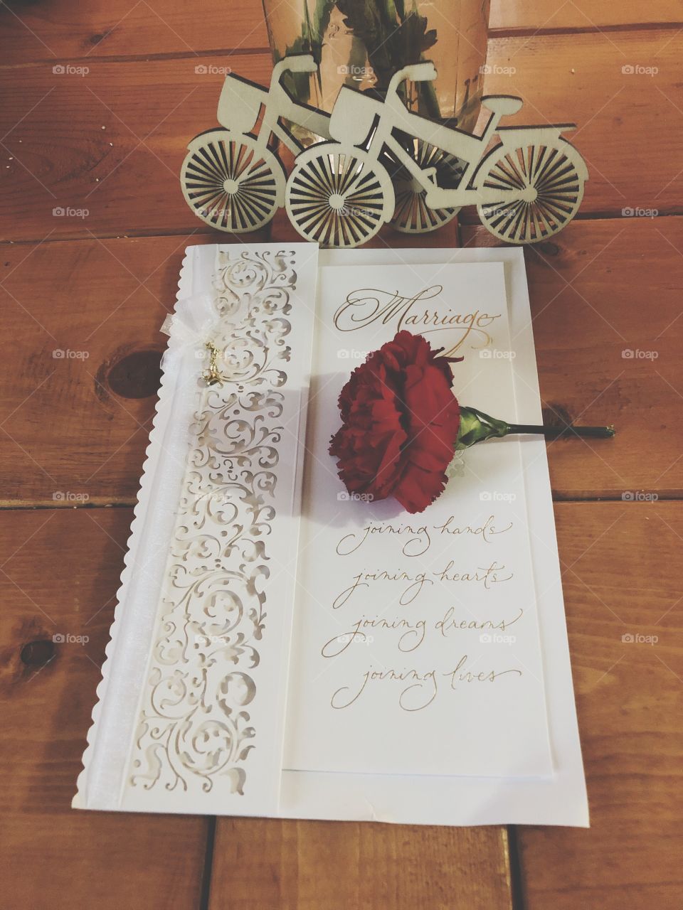 Wedding card with rose and bicycle cake toppers