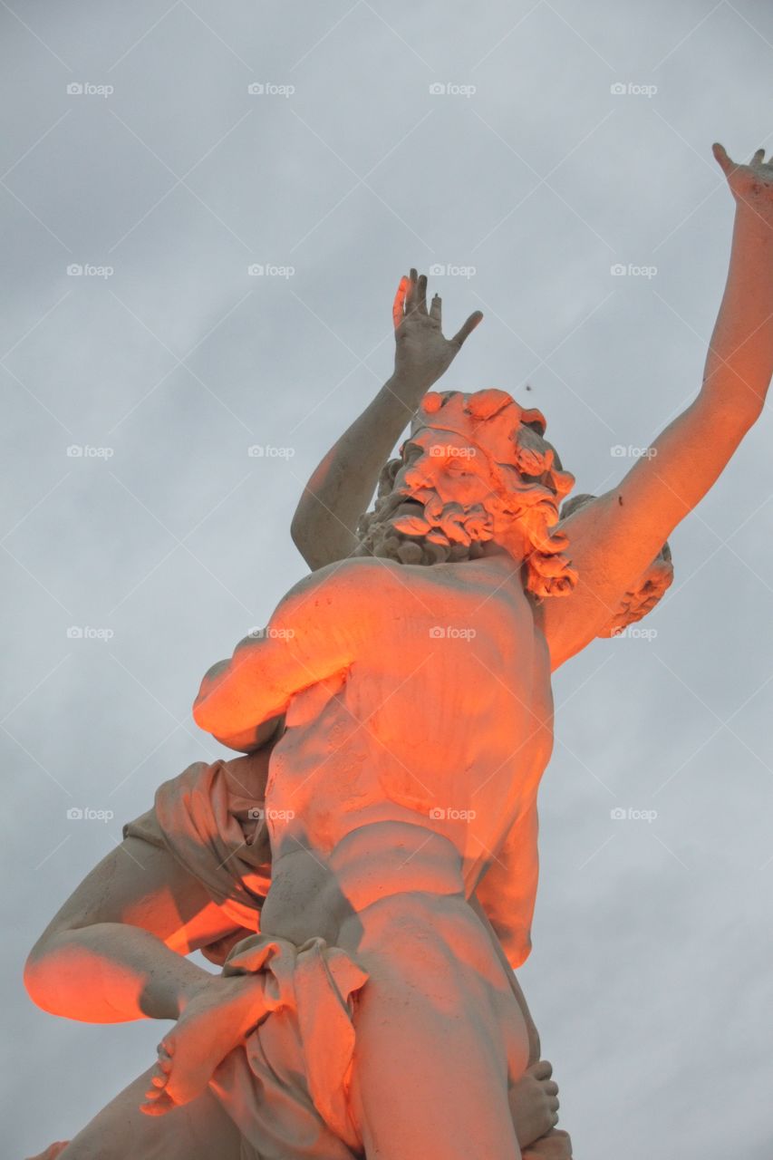 statue of a person in a garden