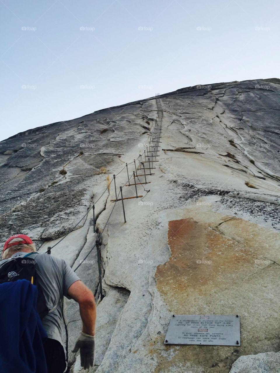 The climb to half dome in Yosemite. It looks scary but after a 9 mile hike you gotta do it