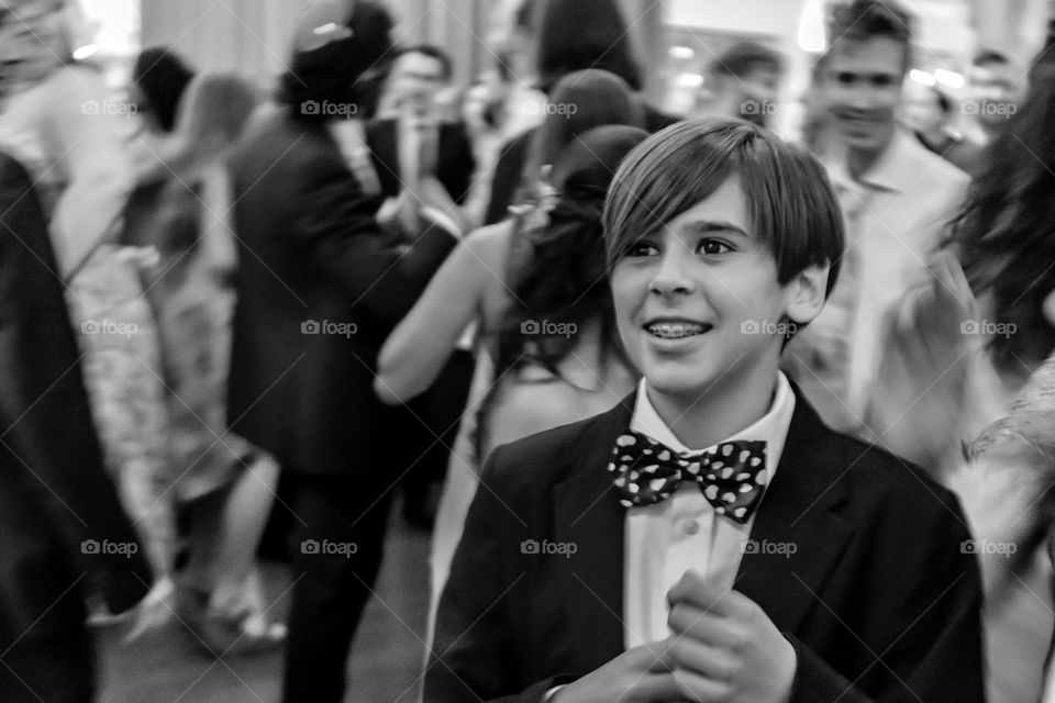 Portrait of a boy on the dance floor at a wedding