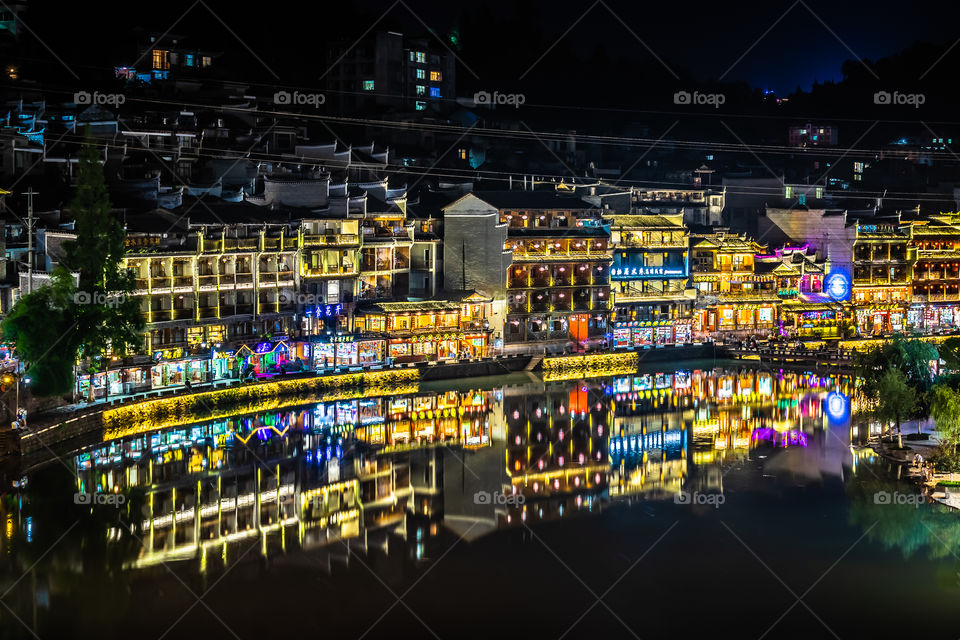 Night of Fenghuang Ancient Town or Phoenix Ancient Town and is situated on the western boundary of Hunan Province.