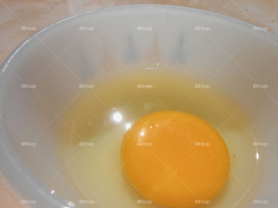 Open Egg In Bowl