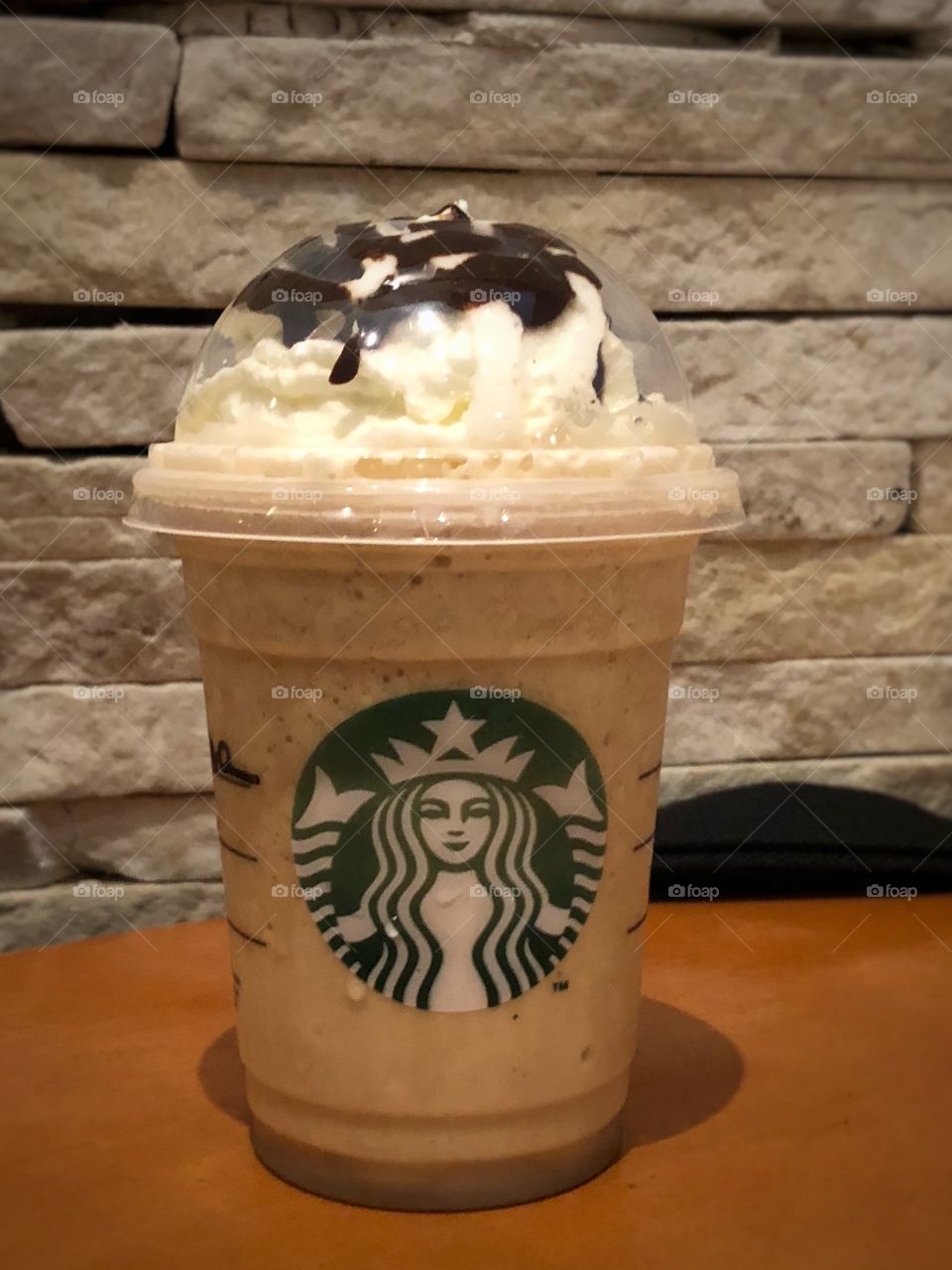A cool Coffee & Chocolate Frappuccino in a late Autumn Afternoon as warm as a Summer night, in a nice environment, with a good company. Nice way to end a working day.