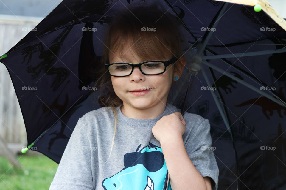 child with umbrella