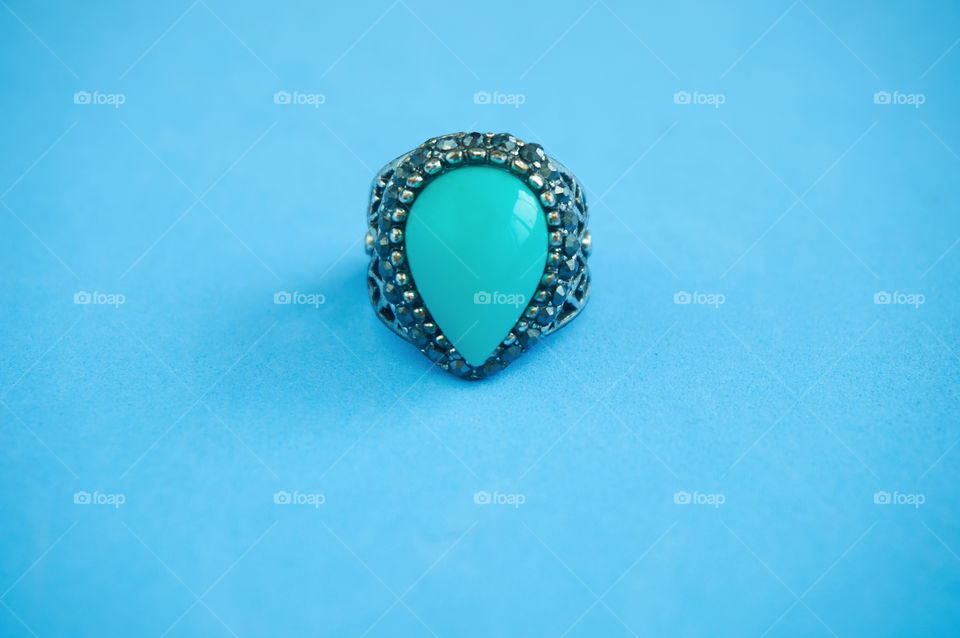 Blue turquoise on blue background with copy space 