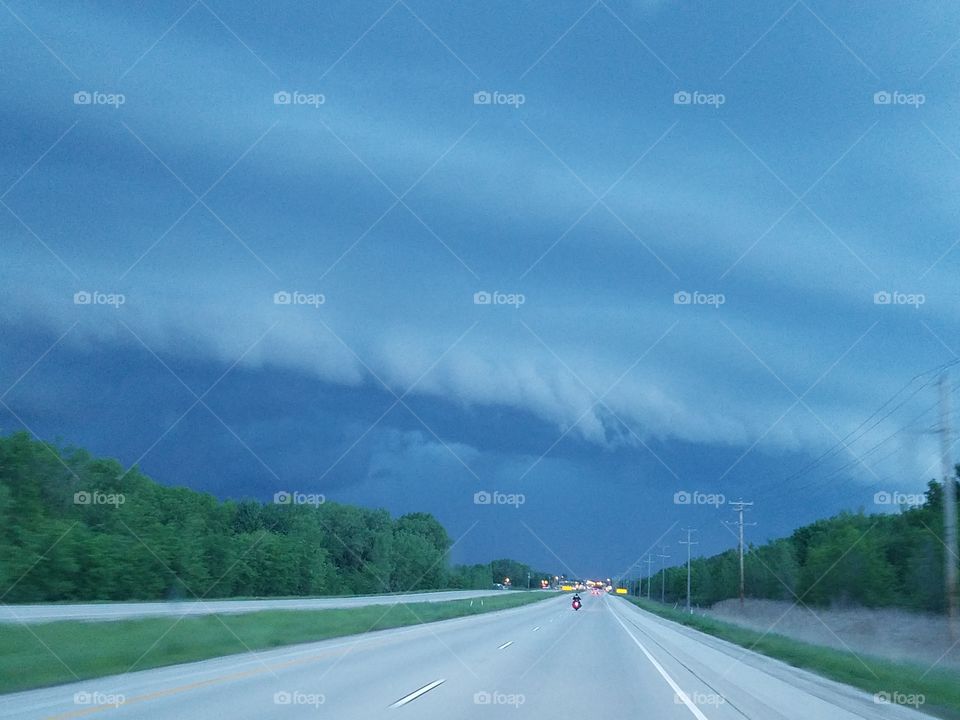 Storm cloud over highway