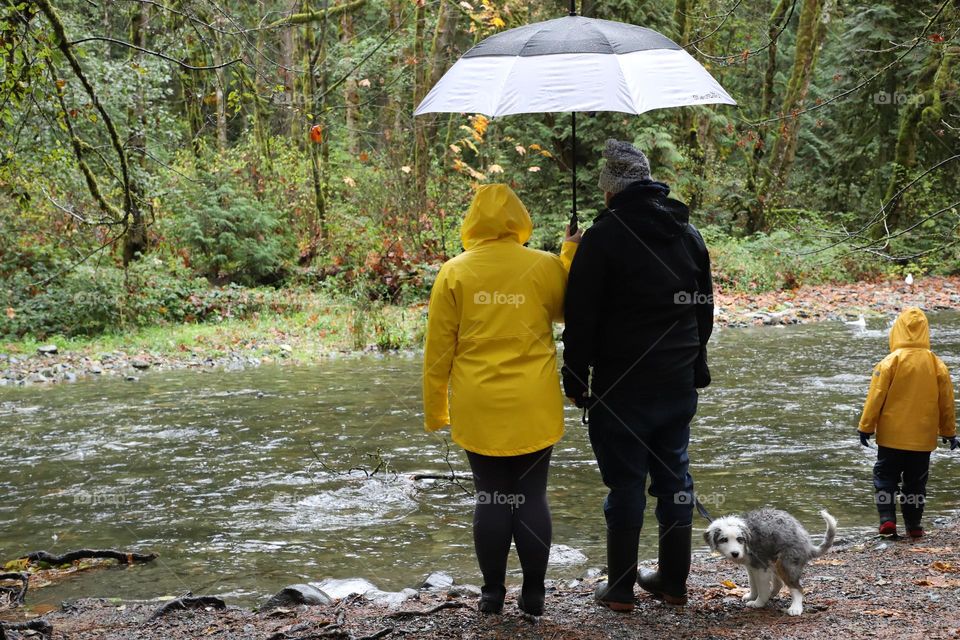 People wearing yellow raincoats 