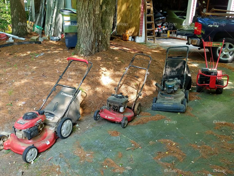 Push Lawnmowers & Snowblower  all in a row.
