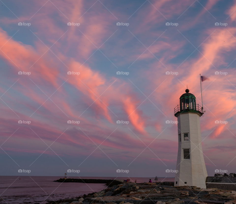 Colorful sky above light house 