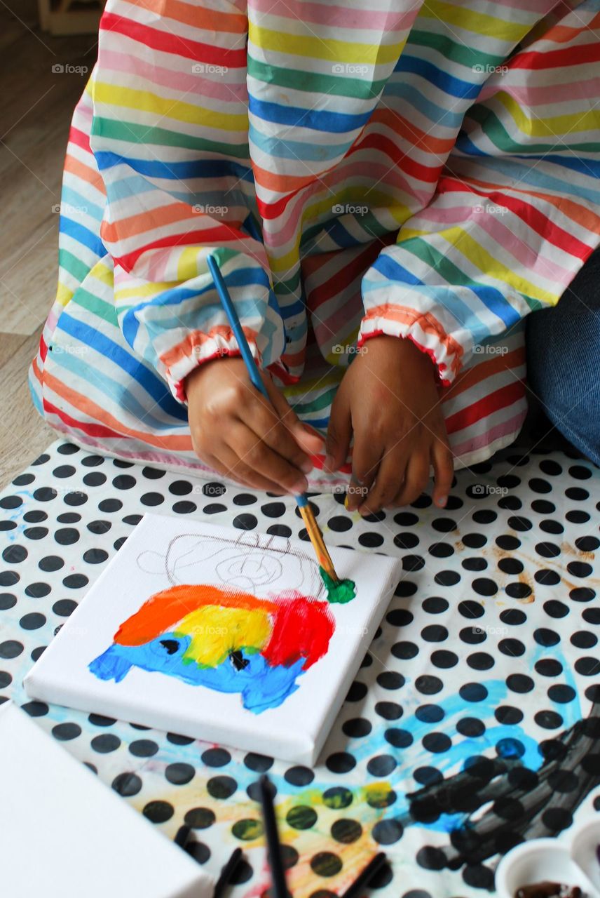 Little girl of mixed race painting