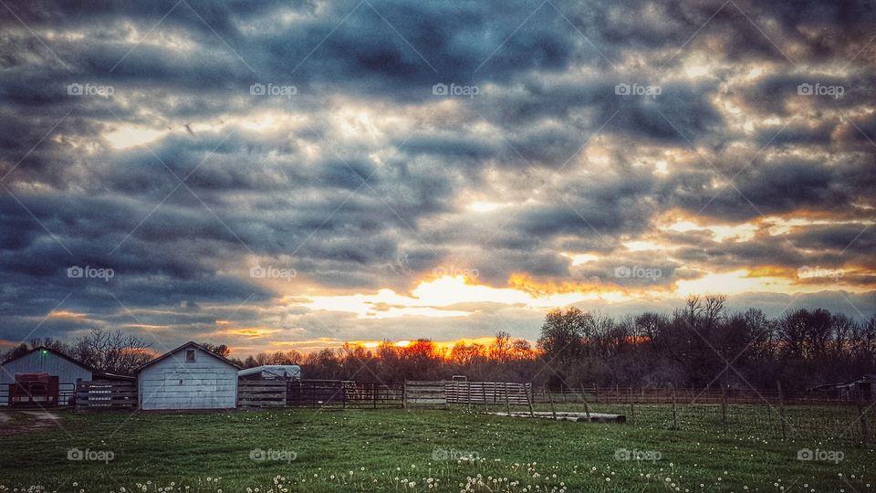 ozarks sunset over the farm
